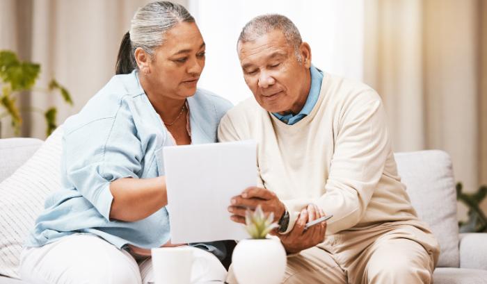 Older couple reviewing documents