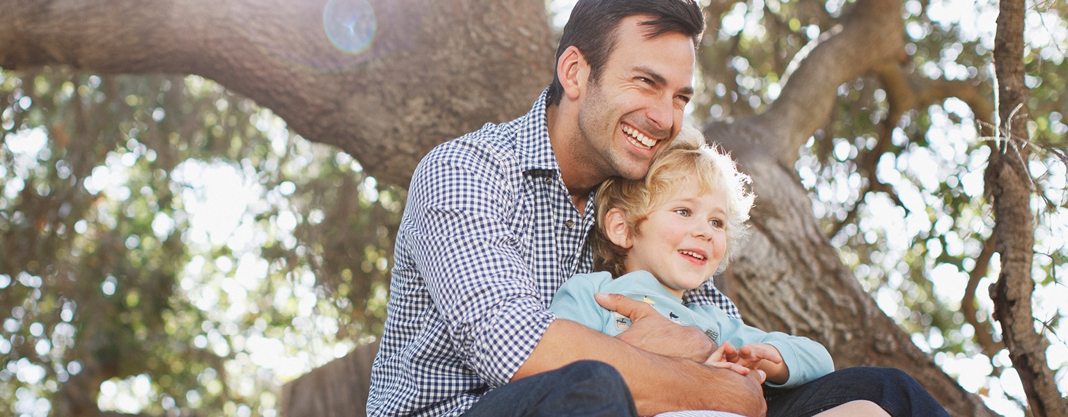 Father and son in tree house